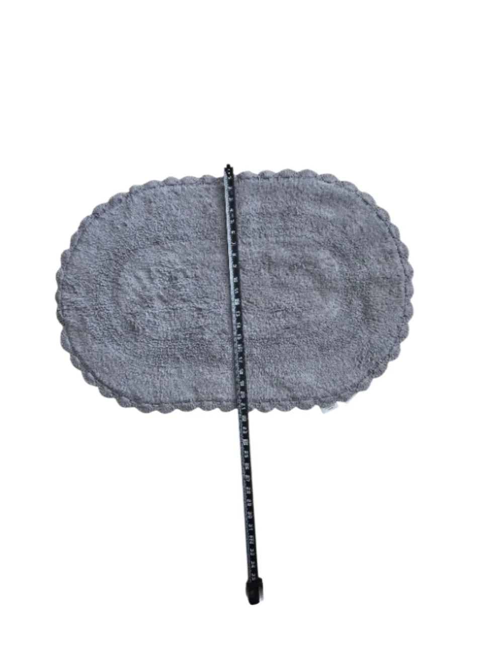 2-piece set of oval cotton bath rugs featuring a crochet border